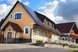 Modernes und gepflegtes Gästehaus mit freundlicher Architektur, großzügigem Außenbereich und einladender Atmosphäre