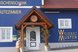 Eingangsbereich des Weinguts Wuster mit Buschenschank und Gästezimmern in einladender, traditioneller Atmosphäre